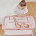 Baby Bassinet Bedside Crib with Mattress & Sheet, 4-Sided Mesh, Pink U3614